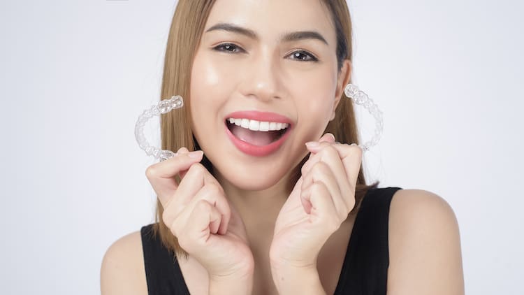 Neglecting oral care during clear aligner treatment can lead to plaque buildup, cavities, and even bad breath.
